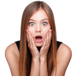 Close-up portrait of surprised beautiful girl